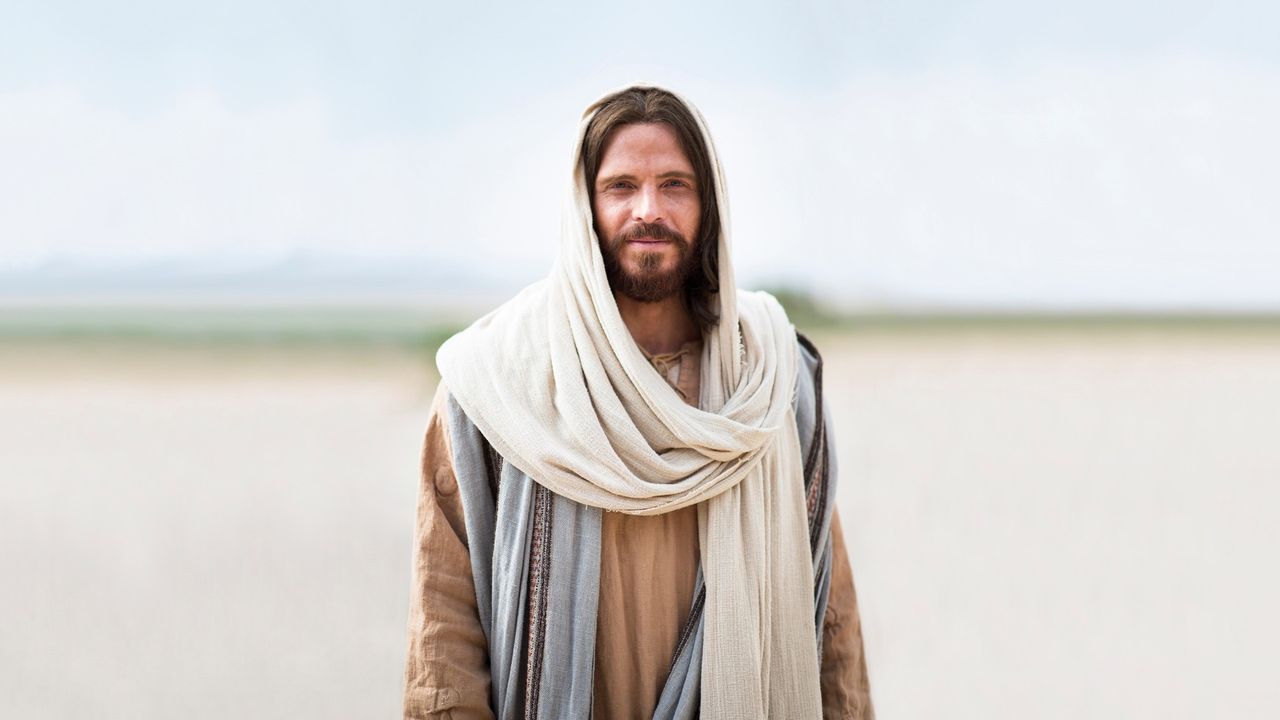 Jezus Christus nodigt glimlachend allen uit om tot Hem te komen
